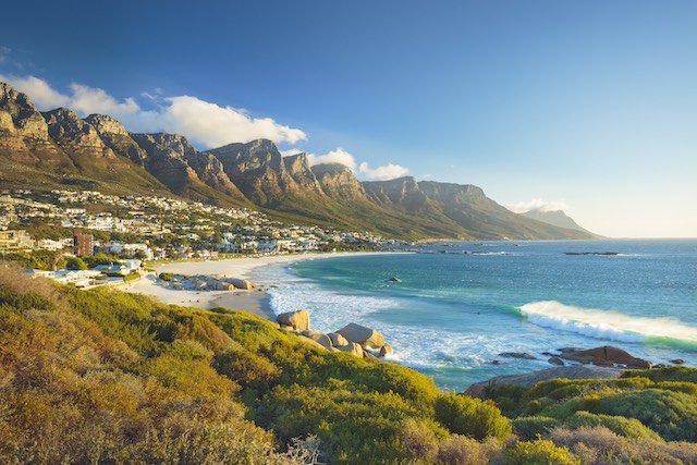 Beach and Twelve Apostles mountain in Camps Bay near Cape Town in South Africa.