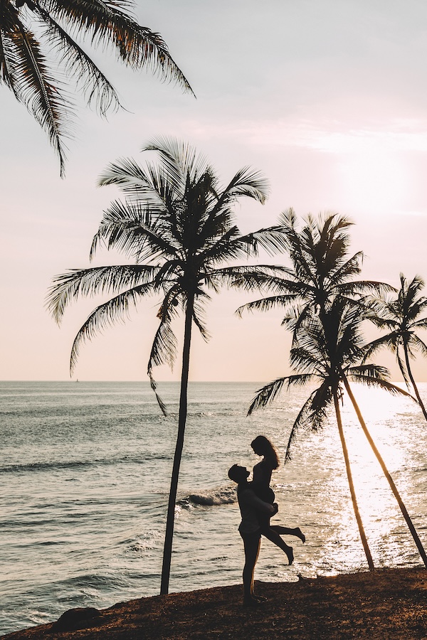Honeymoon Travel by Angela Foks a,couple,in,love,meets,a,sunset,on,the,sea
